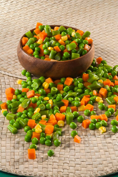 istock Mix cut vegetable in wooden bowl 683310070