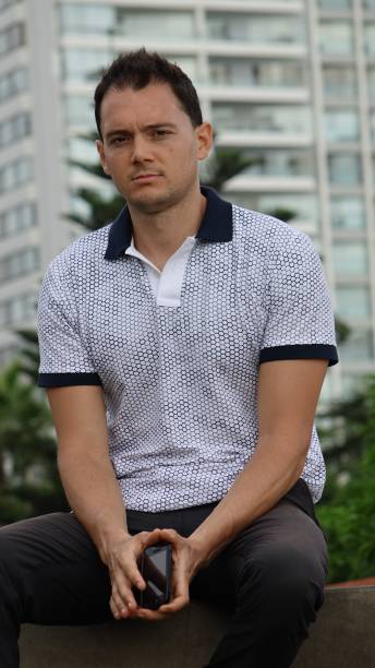 Man Sitting Urban Area