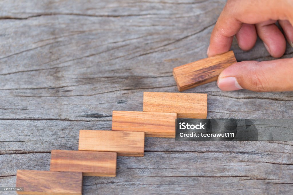 Wooden block Wooden block stacked is concept of structure, building, strategy and growing up Abstract Stock Photo
