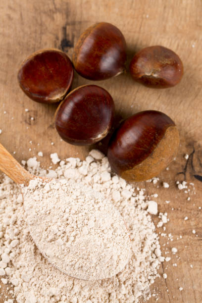 istock chestnut flour in a wooden spoon 683320560