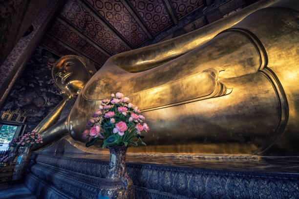istock Reclining buddha in Wat Pho temple, Bangkok 683323136