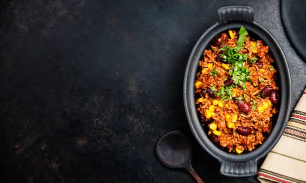 Traditional mexican food - Chili con carne, mexican stew with ground beef, tomato and hot chili peppers