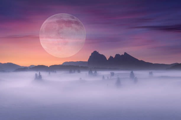 istock Full moon on idyllic fantasy scenery and misty scene 683329740