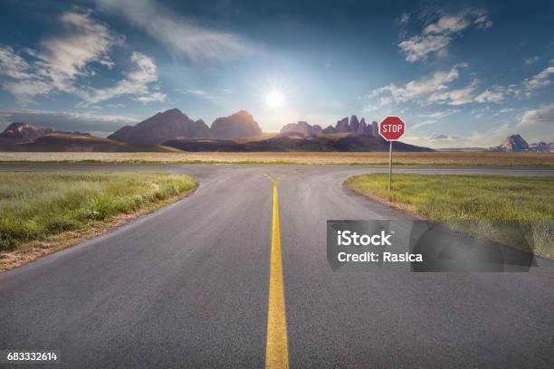 Decision For The Right And A Wrong Way At Intersection Stock Photo - Download Image Now