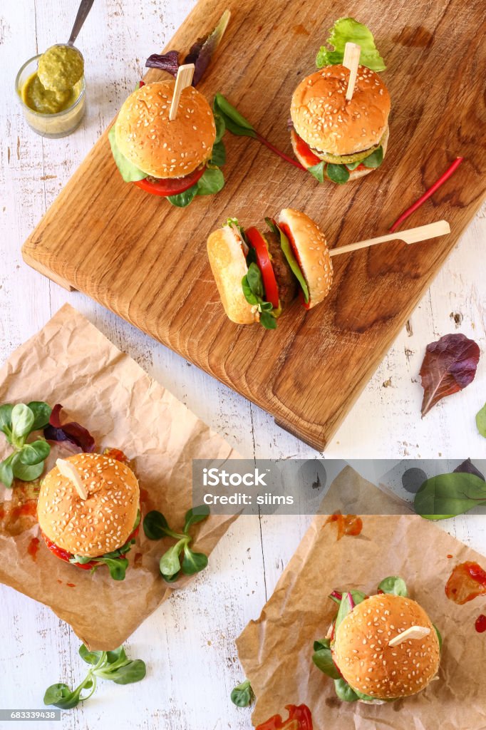 Mini Pesto Burger Sliders Homemade little hamburgers, great appetizers or party food. Slider - Burger Stock Photo