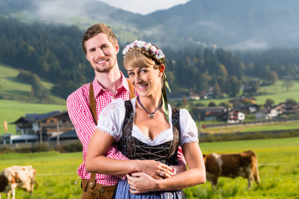 istock Alpine cattle farmers on mountain meadow 683342488