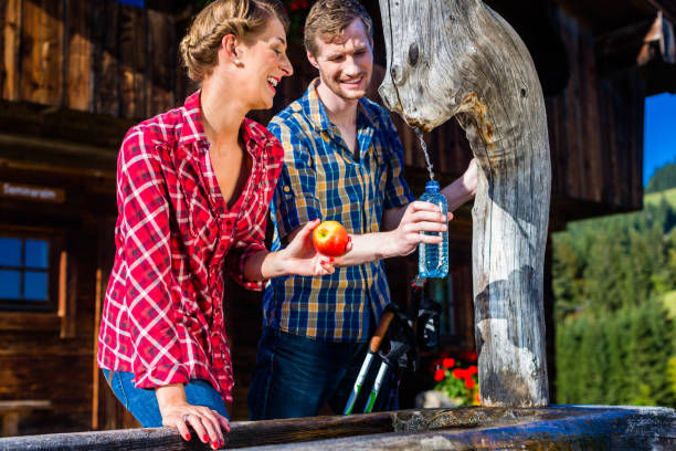 istock Couple resting from hiking in mountain cabin 683342604