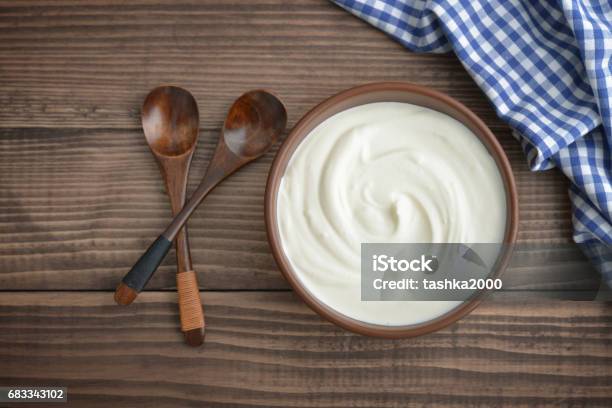 Yogurt In Bowl Stock Photo - Download Image Now - Yogurt, Mousse - Dessert, White Color