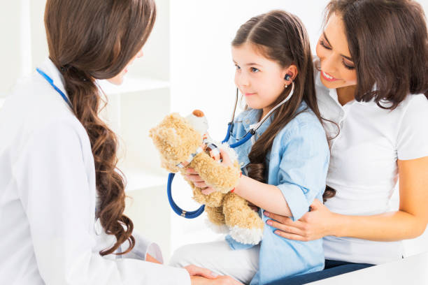istock Pediatrician and family 683343158