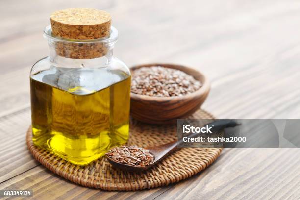 Flax Seeds And Oil Stock Photo - Download Image Now - Flax Seed, Cooking Oil, Fat - Nutrient