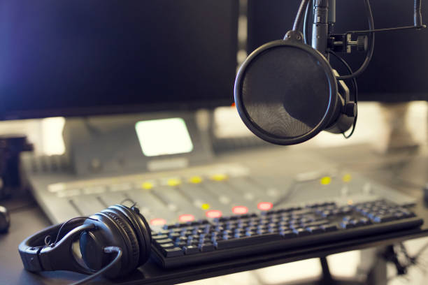istock Microphone and headset in radio station broadcasting studio 683362016