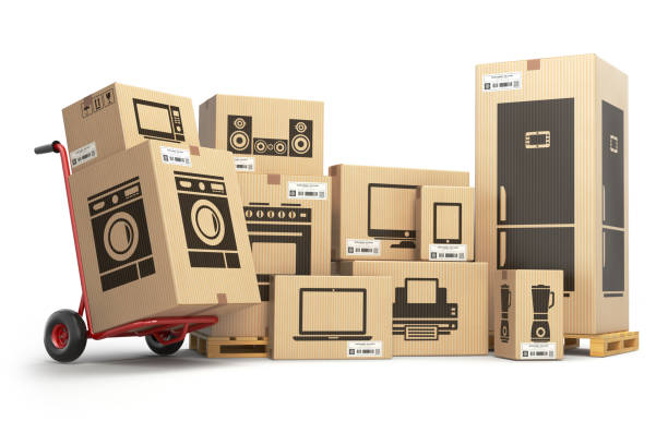 Household kitchen appliances and home electronics in carboard boxes isolated on white