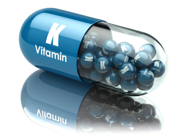 istock Vitamin K capsule or pill. Dietary supplements. 683366696