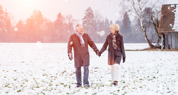 Senior couple having walk in winter