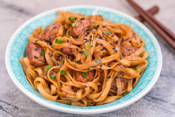 istock Stir Fried noodle with pork in soy sauced 683395410