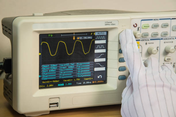 istock Modern oscilloscope, man's hand adjusting wave signals, closeup 683401168