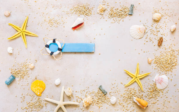 istock Summer travel concept with shells and starfishes on sand 683406000