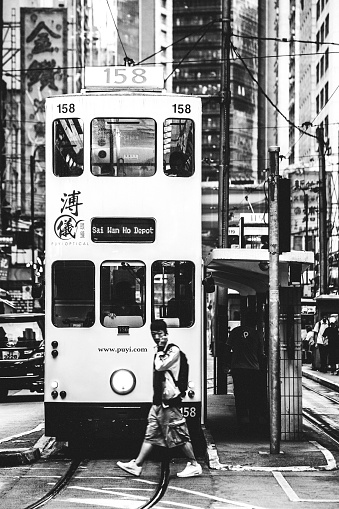 Hong Kong, Hong Kong S.A.R. - May 5, 2014: Old double deck street car in Causeway Bay traffic.