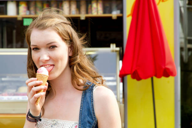 istock Young woman enjoy ice cream 683411270