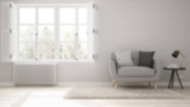 Blur background interior design, minimalist living room, simple white living with big window, scandinavian classic stock photo