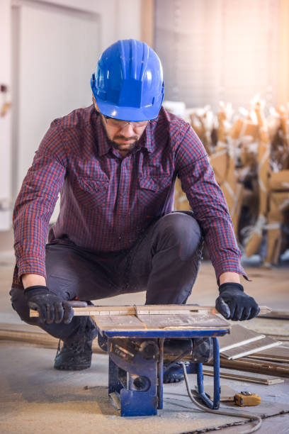 istock Carpenter cutting wooden plank 683431796