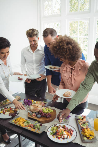 istock Group of friends having meal 683434692