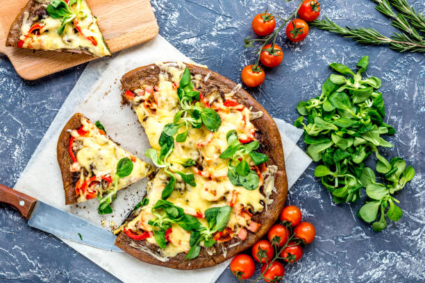 istock cooking pizza with vegetables and cheese on stone desk background top view 683448412