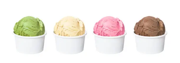 Ice cream scoops in white cups of chocolate, strawberry, vanilla and green tea flavours isolated on white background (clipping path included)