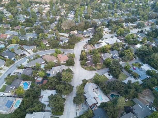 istock Middle-Class Neighborhood with Trees 683471942