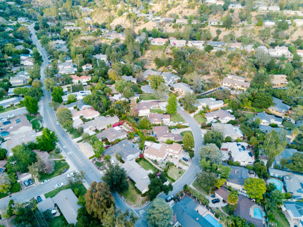 istock Middle-Class Neighborhood with Trees 683472240