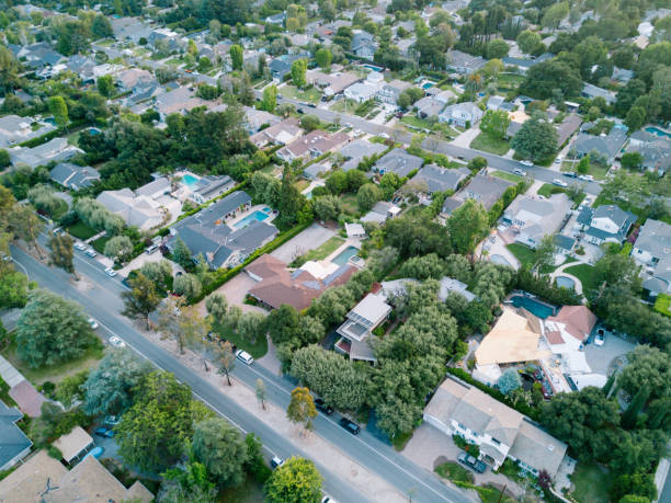 istock Middle-Class Neighborhood with Trees 683472404