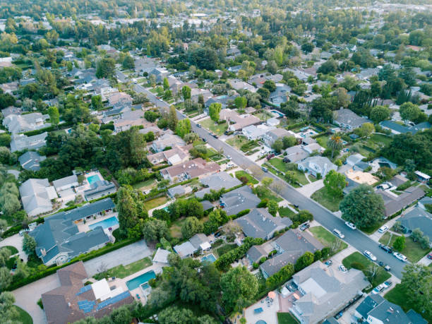istock Middle-Class Neighborhood with Trees 683472494