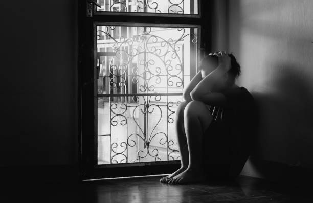 istock sad woman sitting alone 683489902