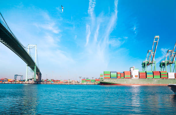 Cargo containers, Port of Los Angeles View of San Pedro port in Los Angeles with cargo containers and bridge san pedro los angeles photos stock pictures, royalty-free photos & images