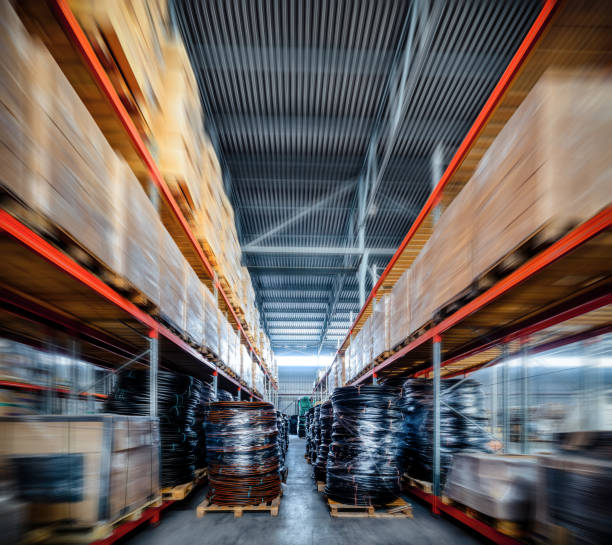 istock Long shelves with a variety of boxes and containers 683499330