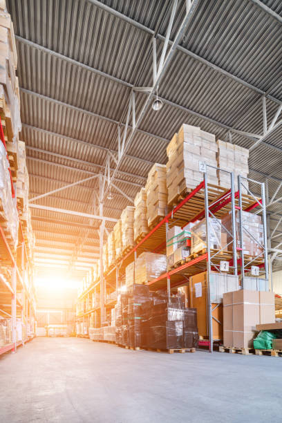 istock Long shelves with a variety of boxes and containers 683499538