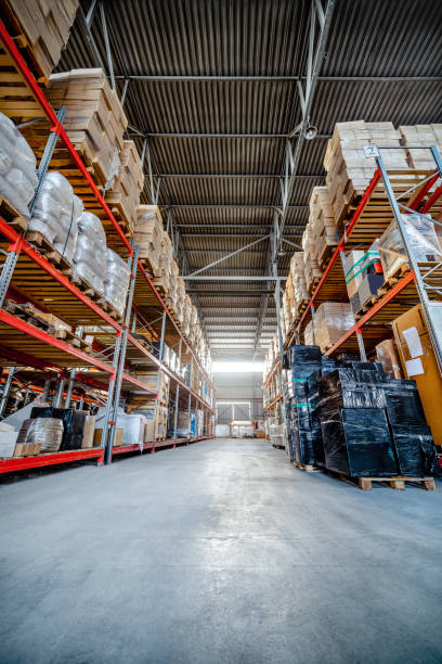istock Long shelves with a variety of boxes and containers 683499610