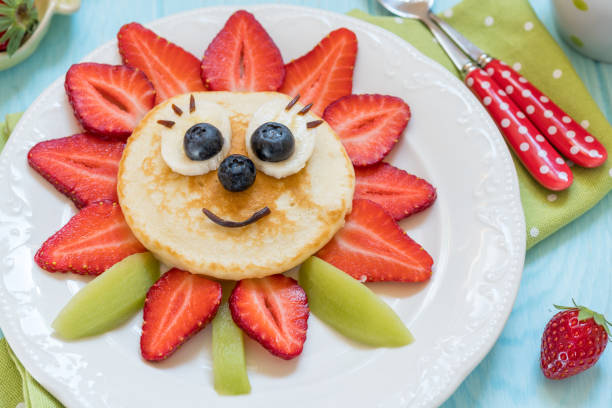 istock Pancakes with berries for kids 683503620