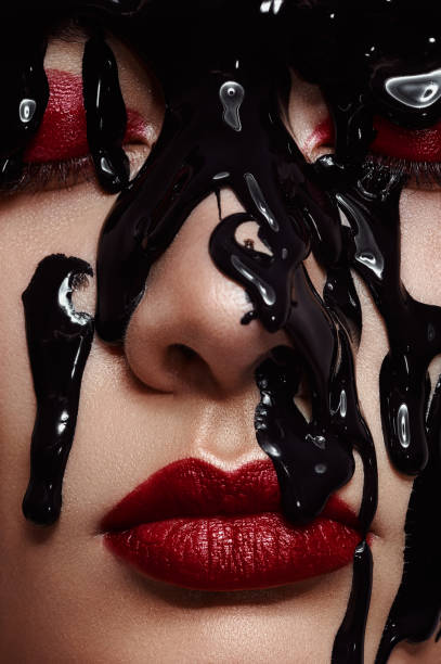 istock Close up Woman Face with dark red Lips 683504692