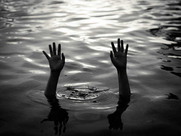 istock Drowning victims, Hand of drowning man needing help. Failure and rescue concept. 683507600