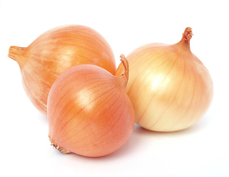 golden onions isolated on white background