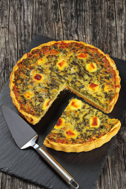 istock tart of egg custard, spinach and cheese 683523232