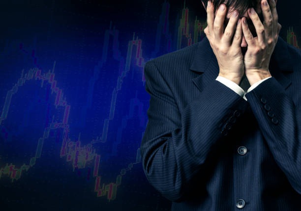 istock Businessman in despair on candlestick chart graphic 683524090