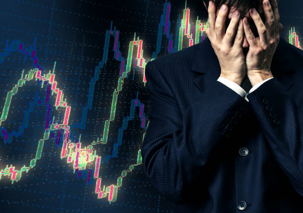 istock Businessman in despair on candlestick chart graphic 683524126
