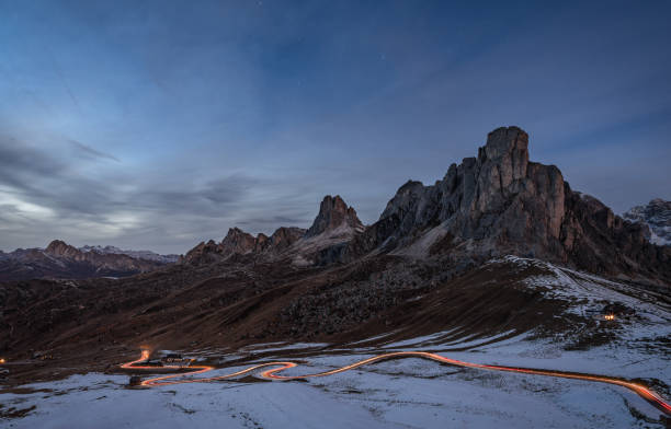 istock Car racing down the Passo Giau 683527246