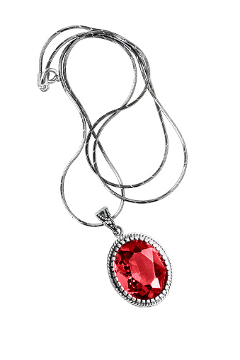 Large ruby medallion on a chain isolated over white