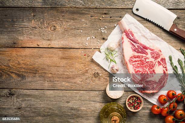 Raw Tomahawk Beef Steak Stock Photo - Download Image Now - Angle, Barbecue - Meal, Barbecue Grill