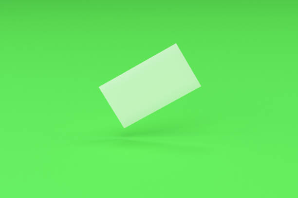 istock White blank business cards mock-up on green background 683539120