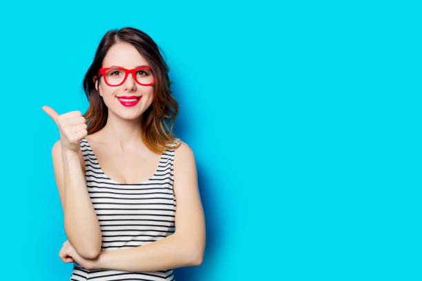 istock young smiling woman in glasses 683539448