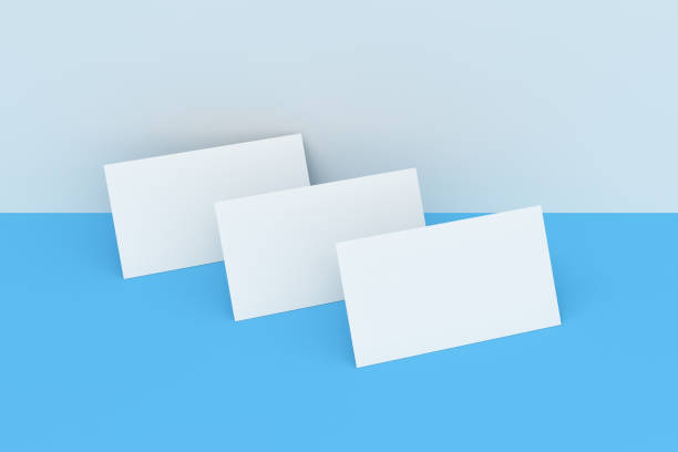 istock White blank business cards mock-up on white and blue background 683539576